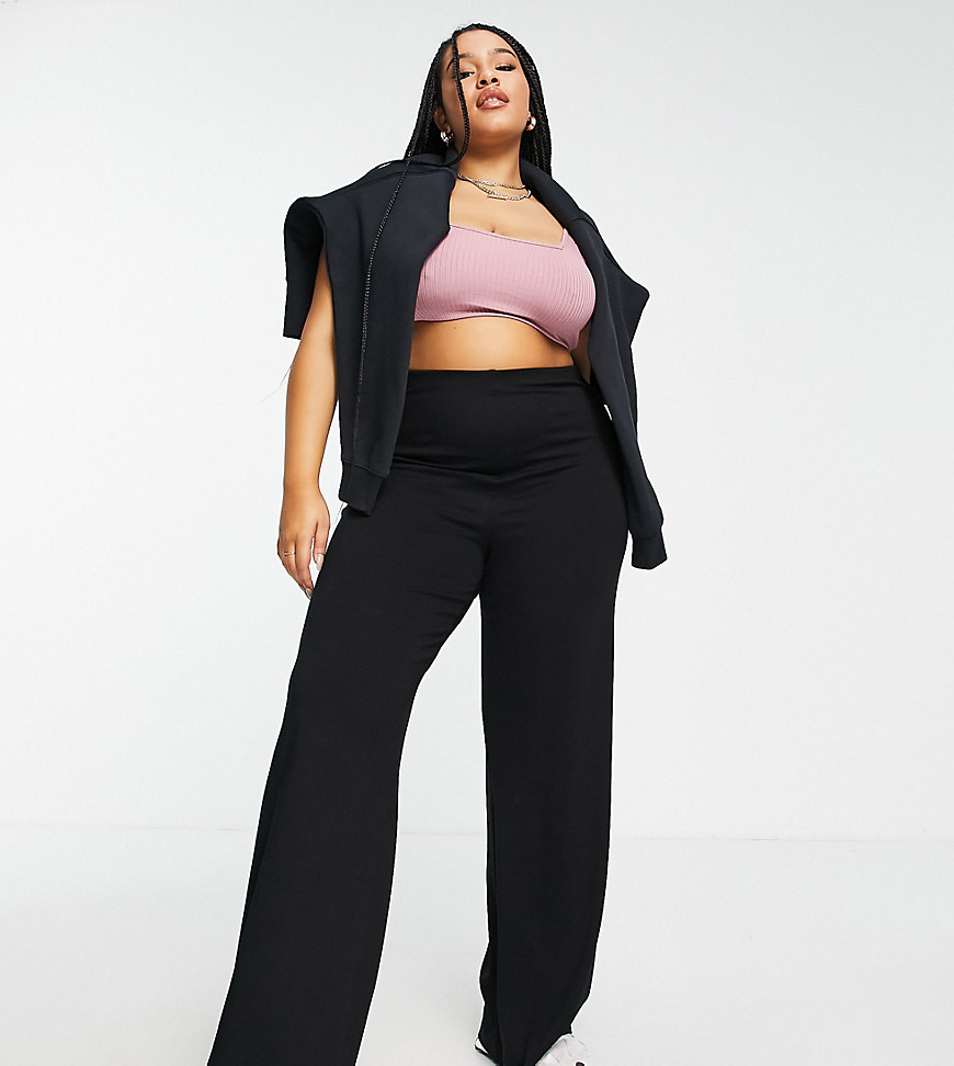 Trousers by ASOS DESIGN Part of our responsible edit Plain design High rise Elasticated waist Wide leg