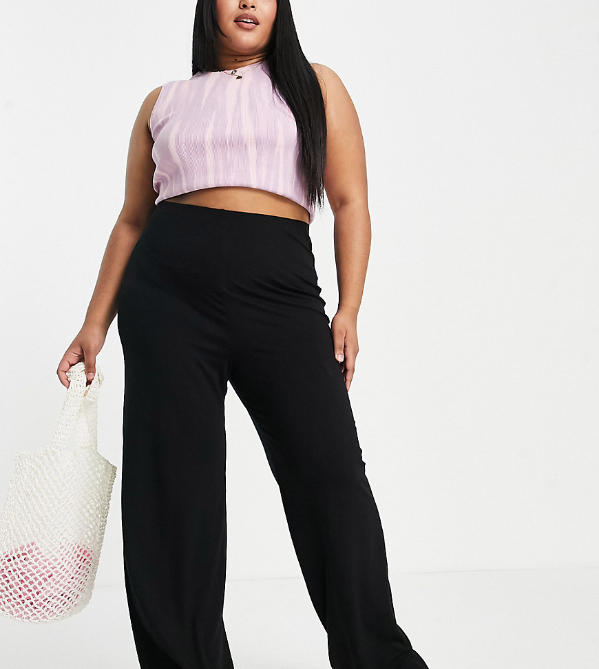 Plus-size trousers by ASOS DESIGN Add-to-bag material Plain design High rise Wide leg