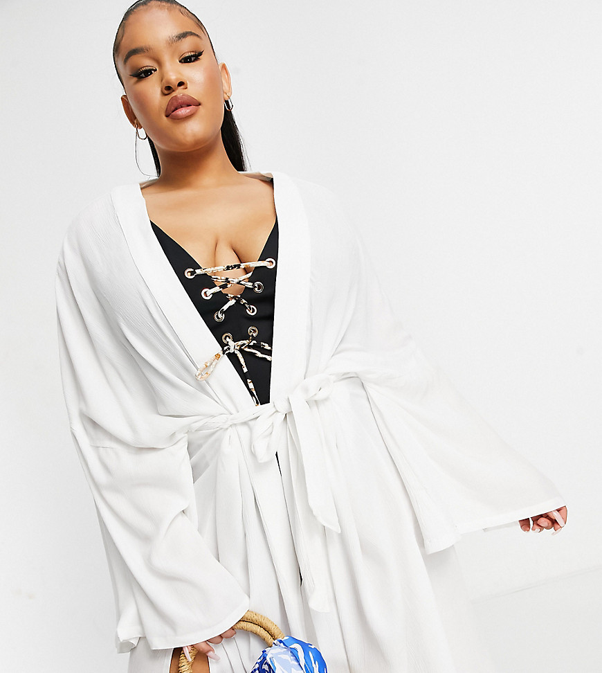 Plus-size beach cover-up by ASOS DESIGN Your bikini%27s BFF Open front Kimono sleeves Tie belt Side splits Relaxed fit Slouchy cut