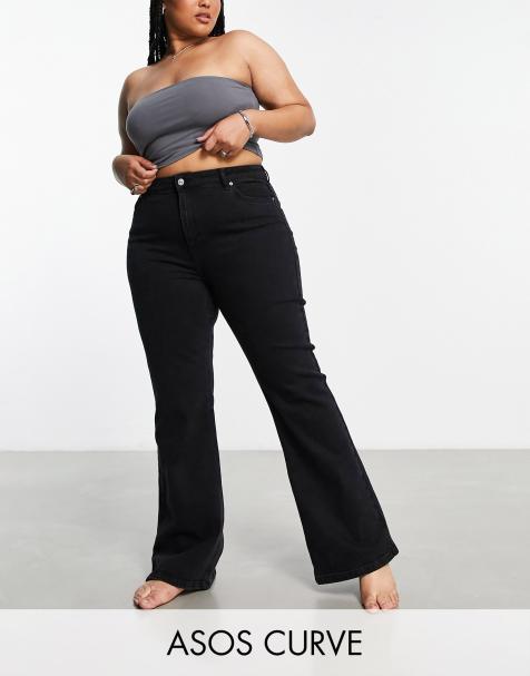 ASOS DESIGN Curve – Bleksvarta flared jeans med medelhög midja - view 1
