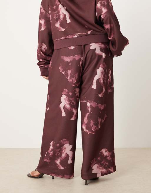 ASOS DESIGN Curve - Blommefarvede joggingbukser med lige ben og gennemgående blomstermønster, 4 af 5