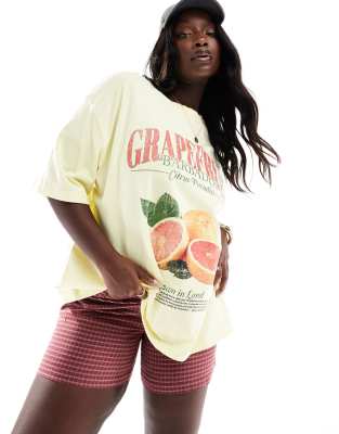 ASOS DESIGN Curve - Boyfriend-T-Shirt in Zitronengelb mit Grapefruit-Grafikprint