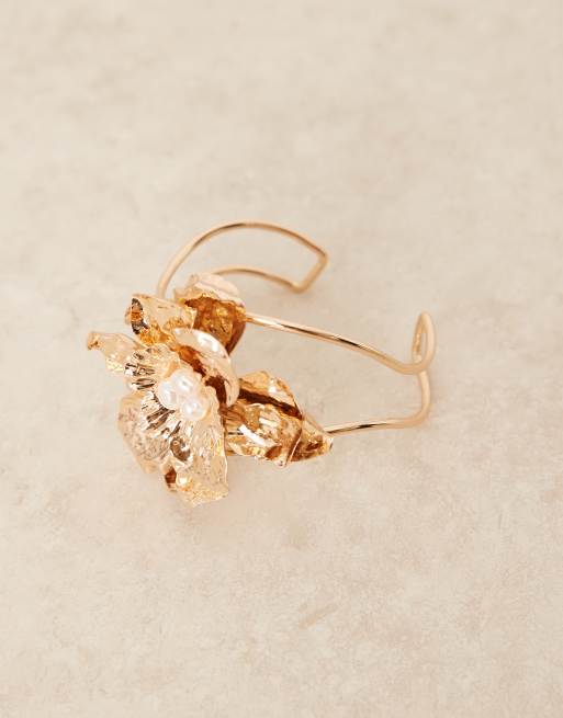 ASOS DESIGN Curve bracelet with statement flower and faux pearls in gold tone