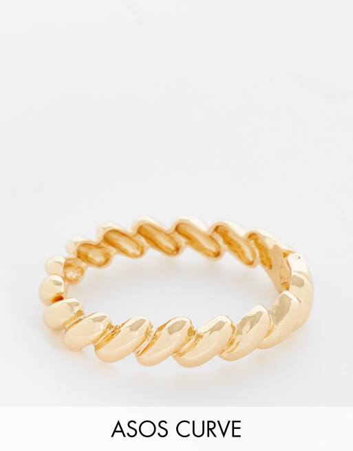 ASOS DESIGN Curve - Brede armband met gedraaid ontwerp in goudkleur