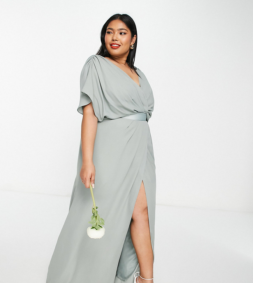 Plus-size dress by ASOS DESIGN Destination: dancefloor Wrap front Satin-style waistband Thigh split Button placket to reverse Regular fit