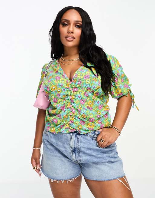 ASOS DESIGN Curve button front tee blouse with ruched waist in bright daisy  floral print