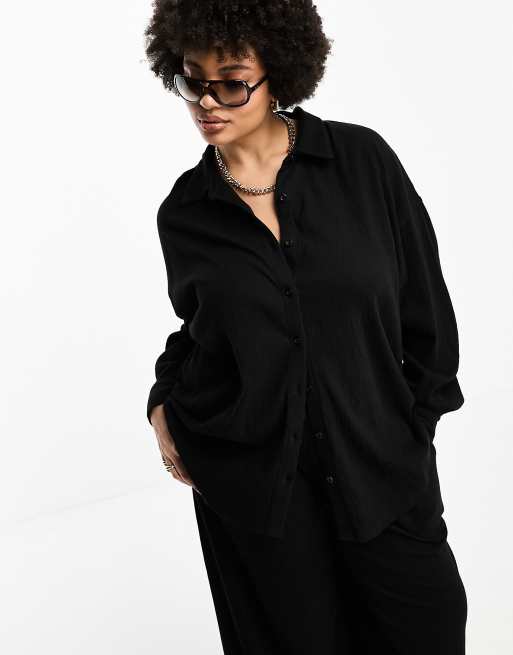ASOS DESIGN Curve - Camicia stropicciata nera oversize in coordinato