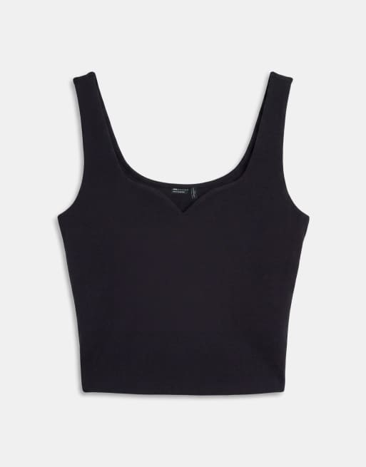 ASOS DESIGN Curve - Camiseta negra de tirantes con cuello curvado de punto de algodón compacto, 5 de 7