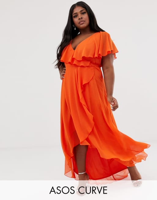 Cape back store dipped hem dress