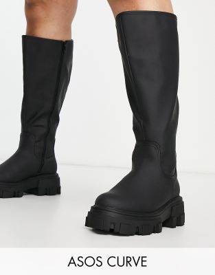 ASOS DESIGN CURVE CARLA CHUNKY FLAT KNEE BOOTS IN BLACK