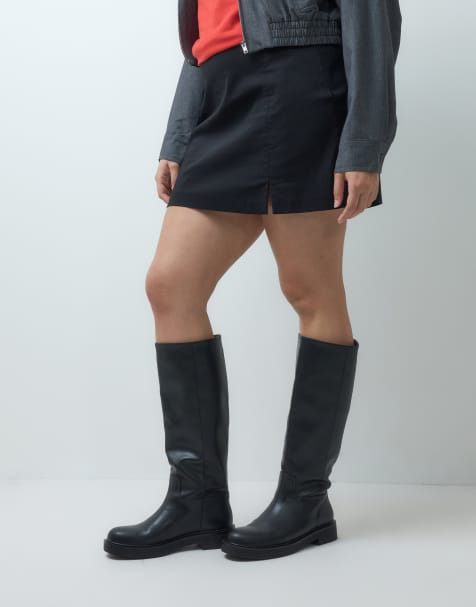 ASOS DESIGN Curve Cerys chunky pull on riding knee boots in black - view 1
