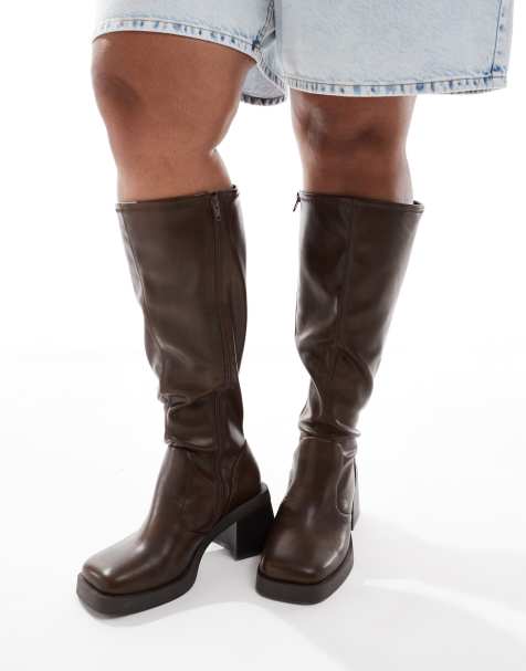 ASOS DESIGN Curve Charlotte heeled knee boots in brown - view 1
