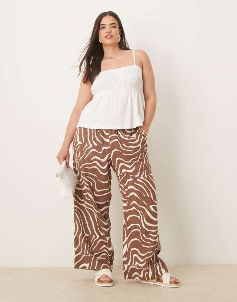 ASOS DESIGN Curve cheesecloth pull on pants with raw edge details in zebra print - view 1