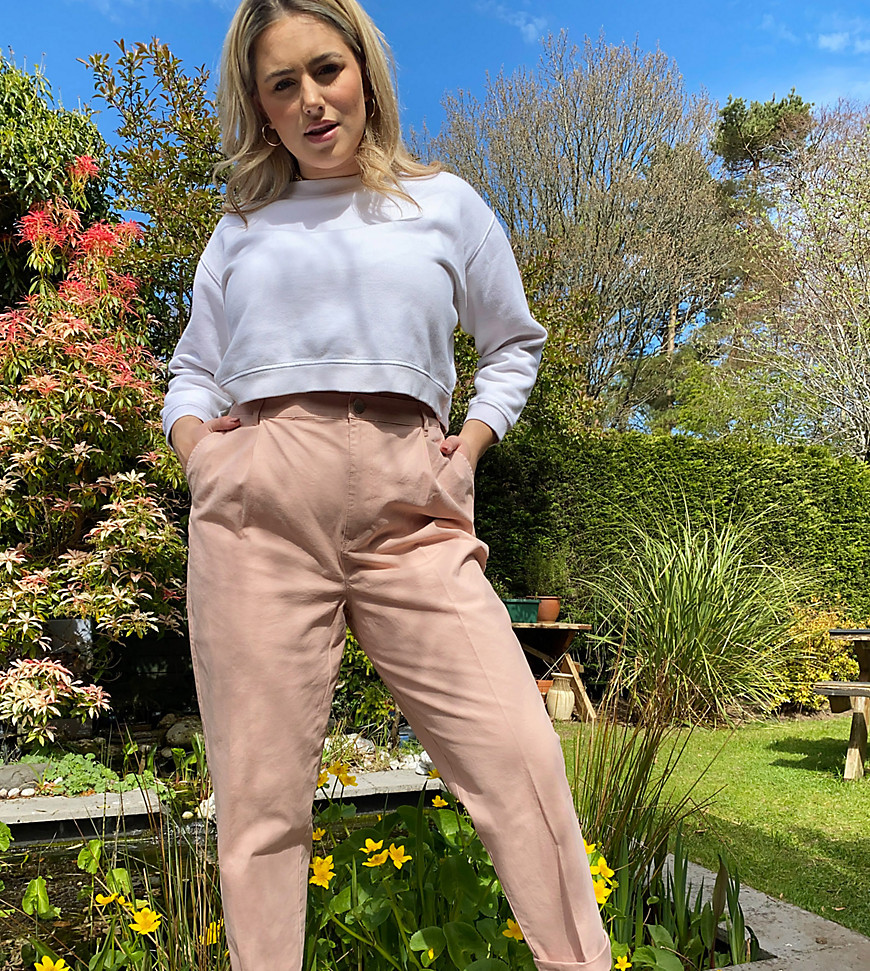 Plus-size trousers by ASOS DESIGN Worn and shot by one of our models at home Part of our responsible edit Belt loops Fly fastening Side pockets Jet back pockets Pleat detailing Regular, tapered fit A standard cut around the thigh with a narrow shape through the leg #AtHomeWithASOS