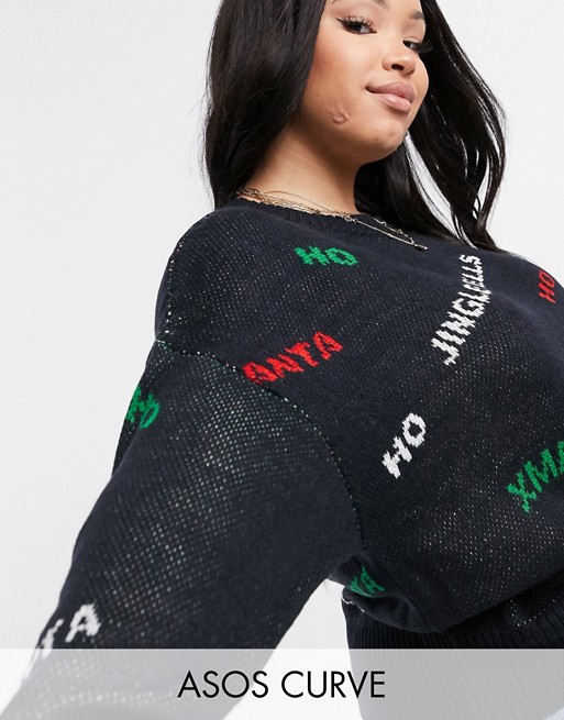 ASOS DESIGN Curve Christmas oversized jumper with multi slogan in black