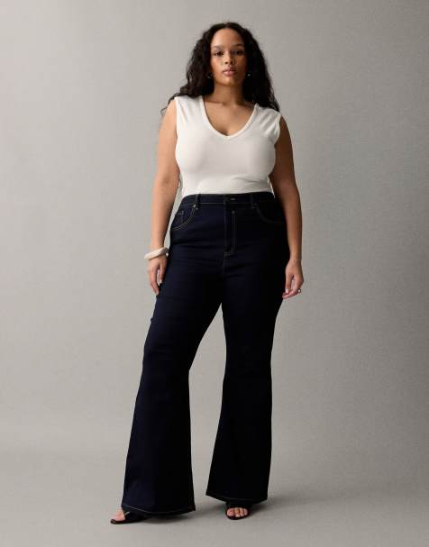 ASOS DESIGN Curve – Ciemnoniebieskie bardzo elastyczne jeansy dzwony o kroju podkreślającym sylwetkę - view 1