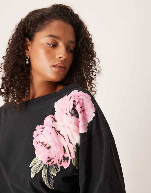 ASOS DESIGN Curve cinched waist slash neck top in black with flower graphic, 3 of 4