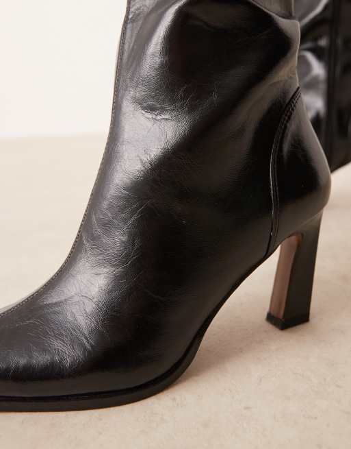 ASOS DESIGN Curve Clara chisel toe knee boots in black