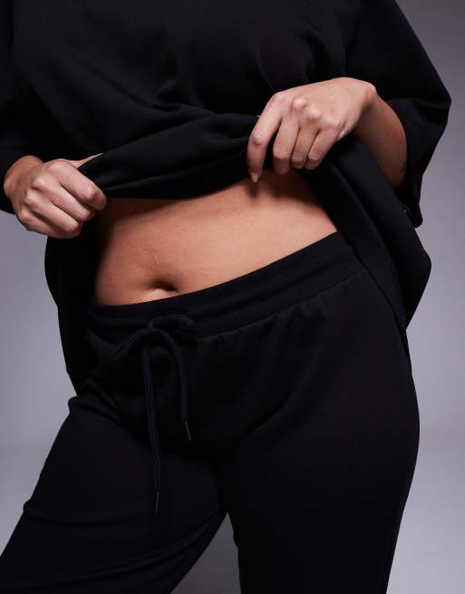 ASOS DESIGN Curve co-ord interlock flared jogger in black, 2 of 5