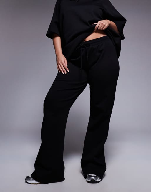 ASOS DESIGN Curve co-ord interlock flared jogger in black, 4 of 5