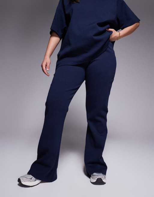 ASOS DESIGN Curve co-ord interlock flared jogger in navy, 2 of 5