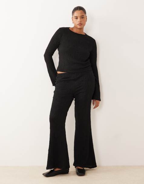 ASOS DESIGN Curve co-ord textured high waist flared leg trousers in black - view 1