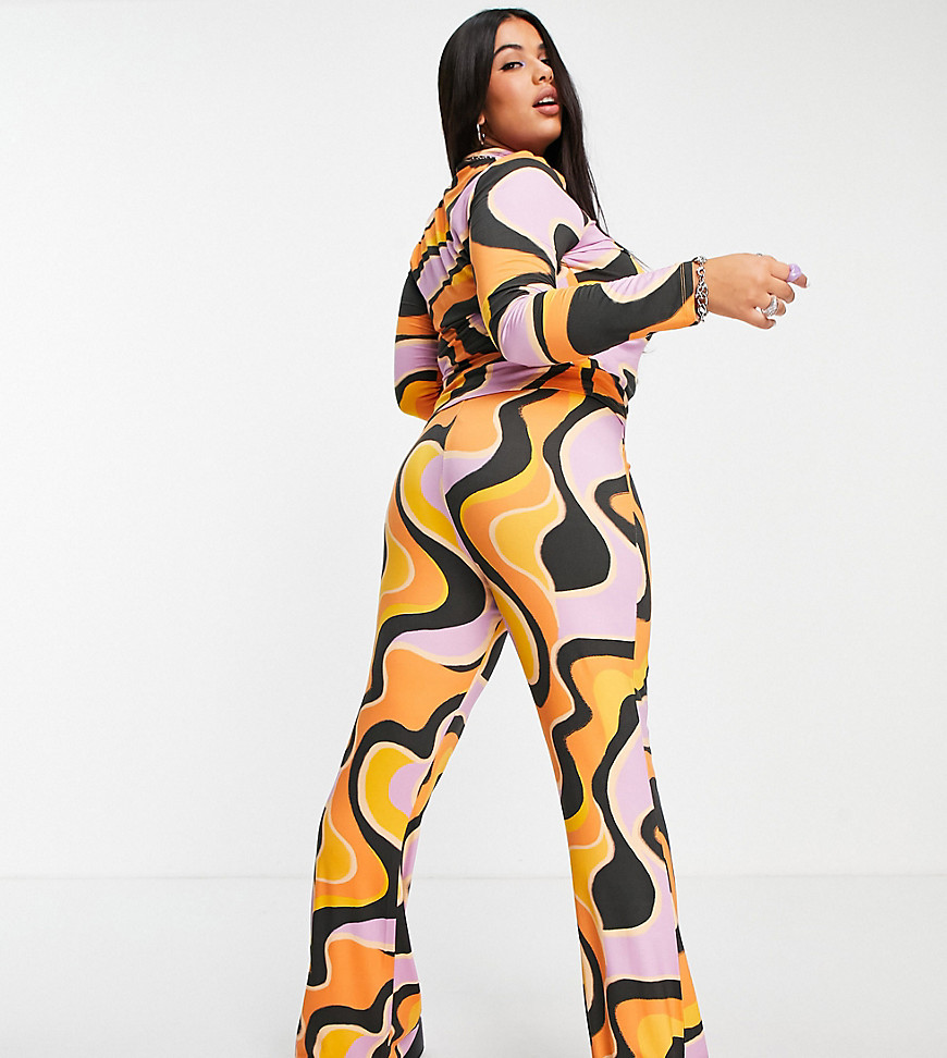 Plus-size trousers by ASOS DESIGN Part of a co-ord set Top sold separately Printed style High rise Flared leg