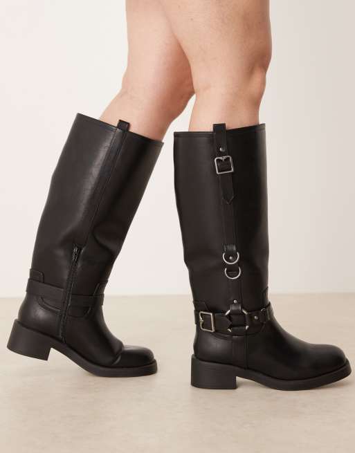 ASOS DESIGN Curve Cobra buckle harness knee boots with silver hardware in black