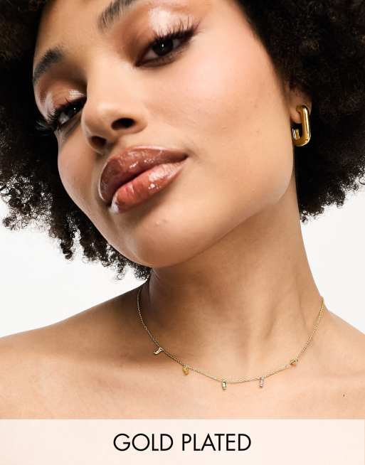 ASOS DESIGN Curve - Collana placcata oro 14 k con pendenti allungati in cristallo arcobaleno