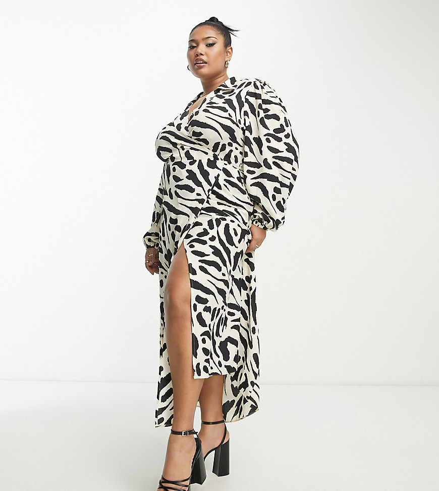 Dresses by ASOS Curve The kind of dress that deserves attention Spread collar Wrap front Tie detail to reverse Side split Regular fit