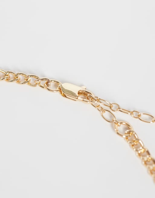 ASOS DESIGN Curve collarino torque con pendente nero color oro, 3 di 4