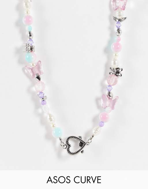 ASOS DESIGN Curve - Collier de perles avec breloques fantaisie et barre en T avec cœur - Argenté