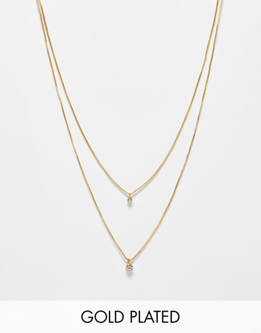 ASOS DESIGN Curve - Collier multi-rangs en plaqué or 14 carats avec pendentifs cristaux 