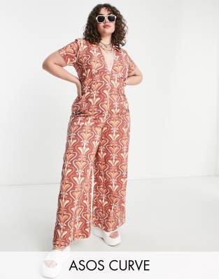 ASOS DESIGN Curve twill collar jumpsuit with wide leg in retro swirl print - ASOS Price Checker