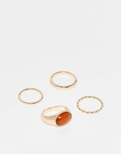 ASOS DESIGN Curve - Confezione da 4 anelli dorati misti con pietra semipreziosa sintetica