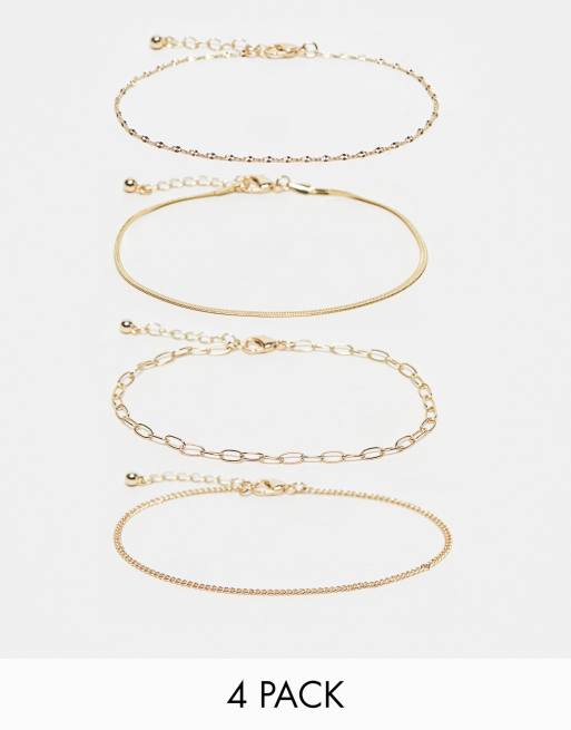 ASOS DESIGN Curve - Confezione da 4 cavigliere color oro a catenina