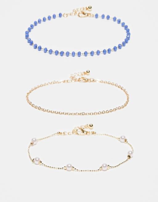ASOS DESIGN Curve - Confezione multipack di cavigliere color oro con perle sintetiche e perline blu