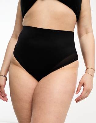 ASOS DESIGN Curve - Contouring - Slip in Schwarz mit mittlerem Halt, hohem Bund und Netzstoffeinsatz-Black