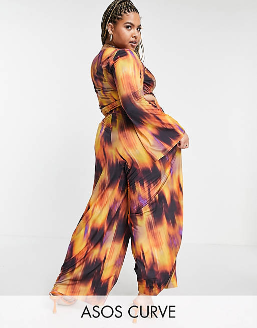 ASOS DESIGN Curve coordinating pull-on wide leg pants in 70s flame print 