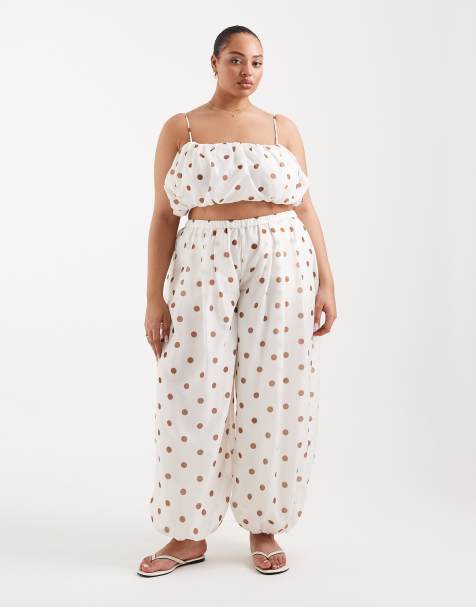 ASOS DESIGN Curve - Coordinato con top con volant e pantaloni a palloncino color terracotta a pois - view 1