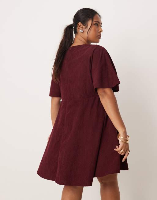 ASOS DESIGN Curve cord t-shirt mini dress with stitching detail in plum