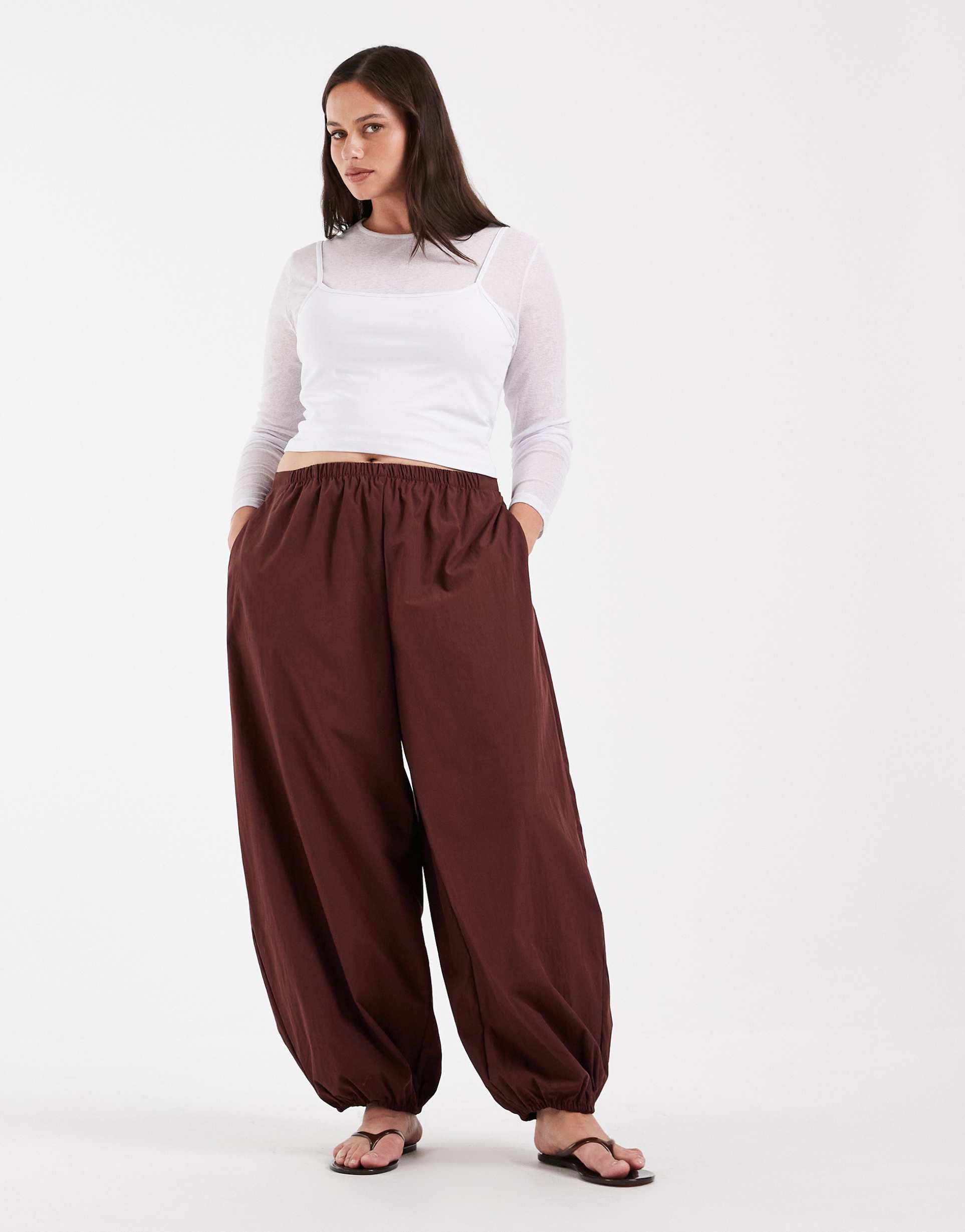 asos design curve cotton nylon blend pull on balloon pants in brown
