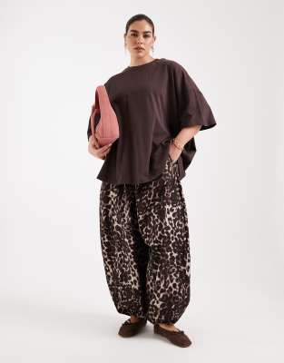 ASOS Curve ASOS DESIGN Curve cotton nylon blend pull on balloon trousers in animal print-Multi