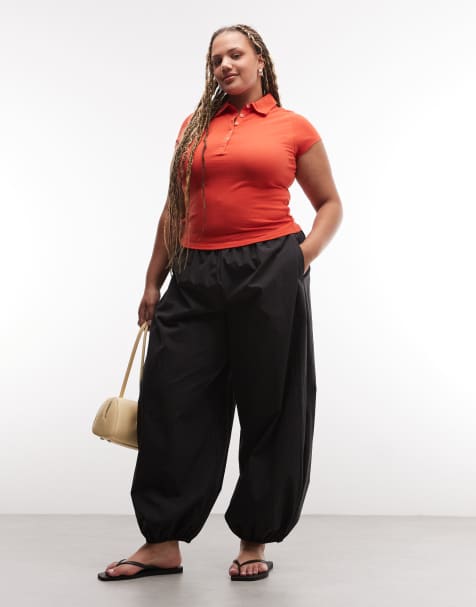 ASOS DESIGN Curve cotton nylon blend pull on balloon trousers in black - view 1