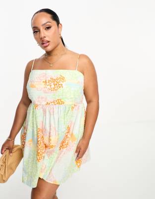 ASOS DESIGN Curve cotton pleat bust mini babydoll sundress in patched floral-Multi