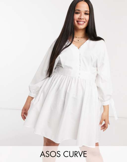 ASOS DESIGN Curve cotton poplin button neck mini smock dress with tie sleeves in white