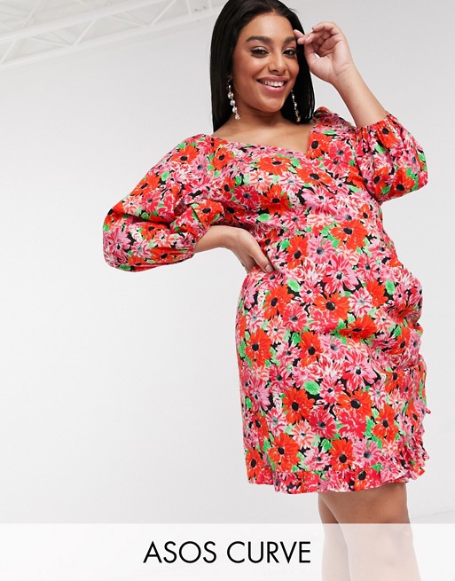 ASOS DESIGN Curve cotton poplin wrap mini dress with puff sleeves in bright floral print
