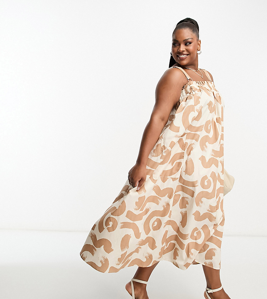 ASOS DESIGN Curve cotton trapeze dungaree midi sundress in brown abstract print-Multi