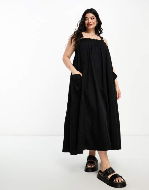 Rouya Couture - Dungaree Dresses in Black Turn up the Heat with this  Definite, Classic Style Dungaree Dress in Effortless Black. Lightweight  Poly Viscose Suiting in Black, comfortable drape & A-Line flare