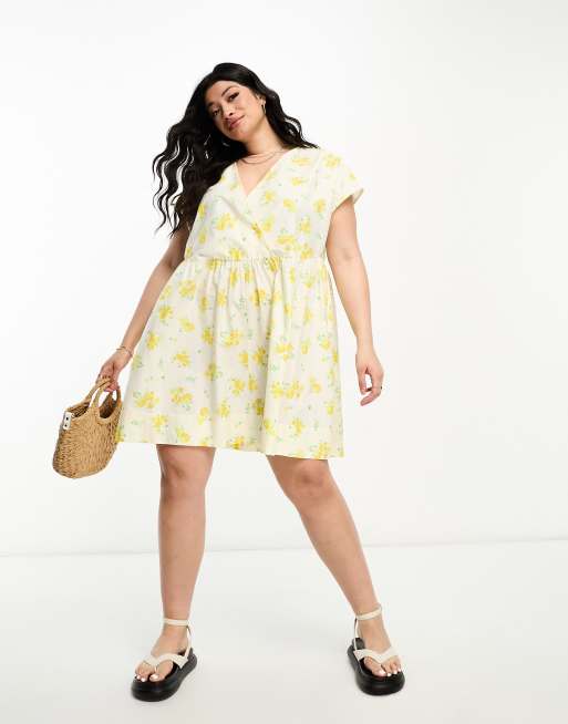 ASOS DESIGN Curve cotton v neck mini smock dress in ditsy floral